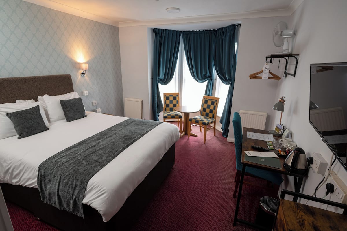 Desk, iron/ironing board, WiFi (free), bed sheets