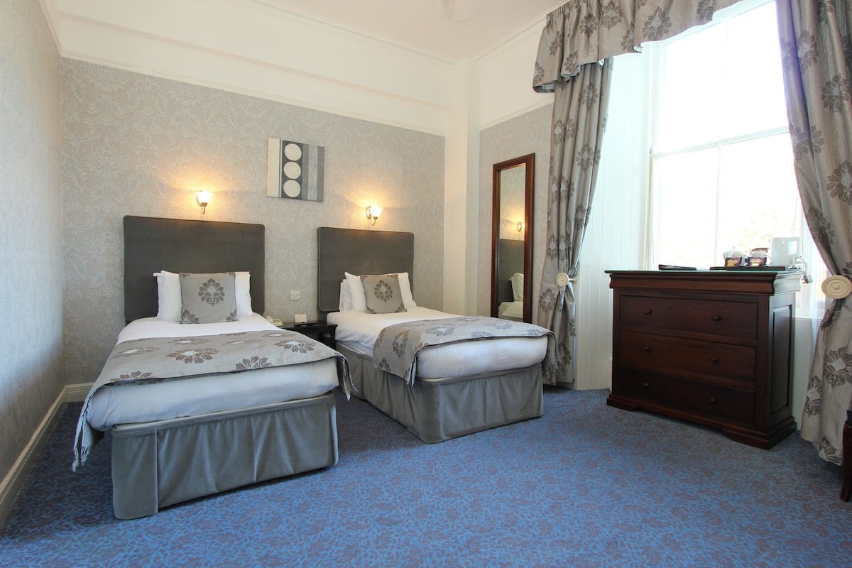 Twin Room with Valley View | Pillowtop beds, desk, iron/ironing board, free WiFi