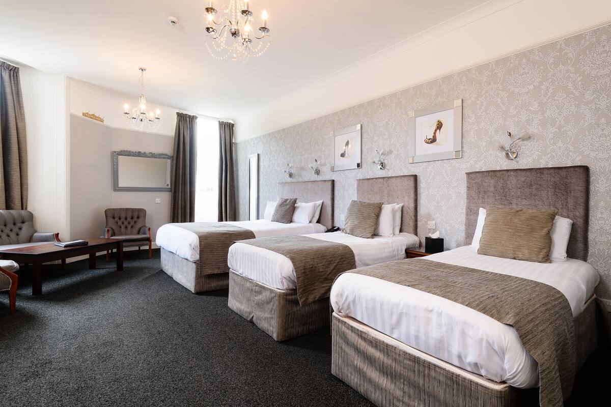 family suite | 1 bedroom, pillow-top beds, desk, iron/ironing board