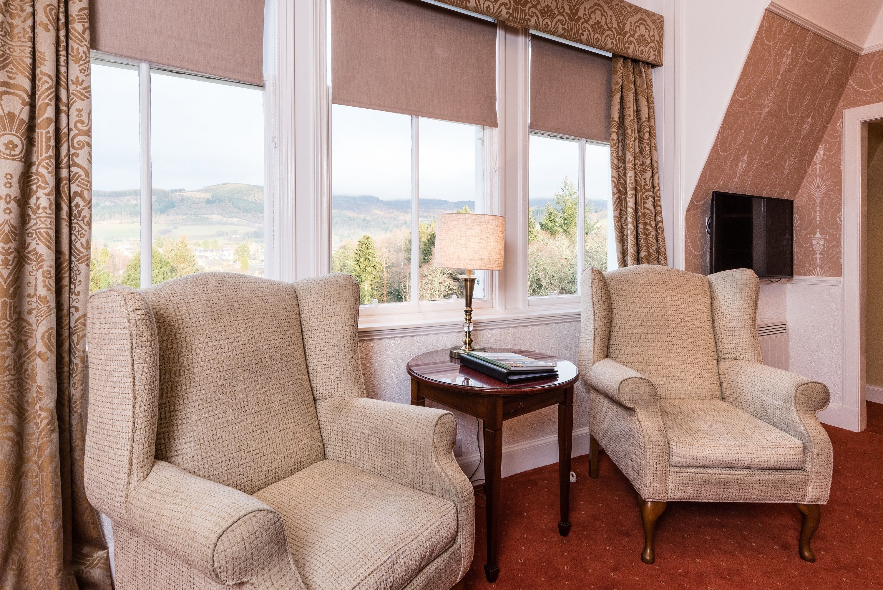 junior suite, 1 bedroom, non smoking, mountain view | living room | smart tv