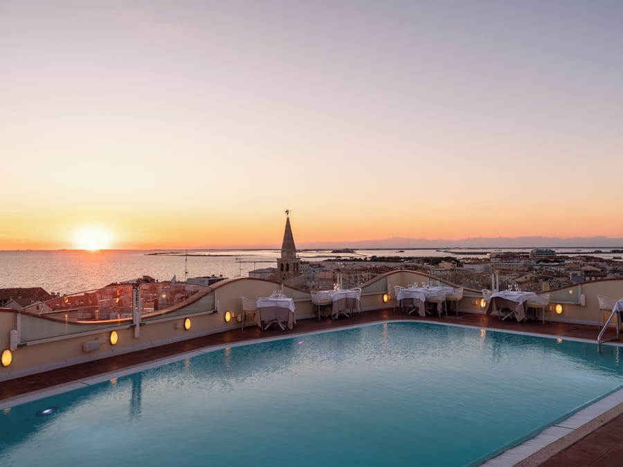 Indoor pool, seasonal outdoor pool, pool umbrellas, sun loungers