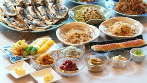 A variety of dishes including fish, vegetables, and rice. - Numazu Riverside Hotel (Numazu)
