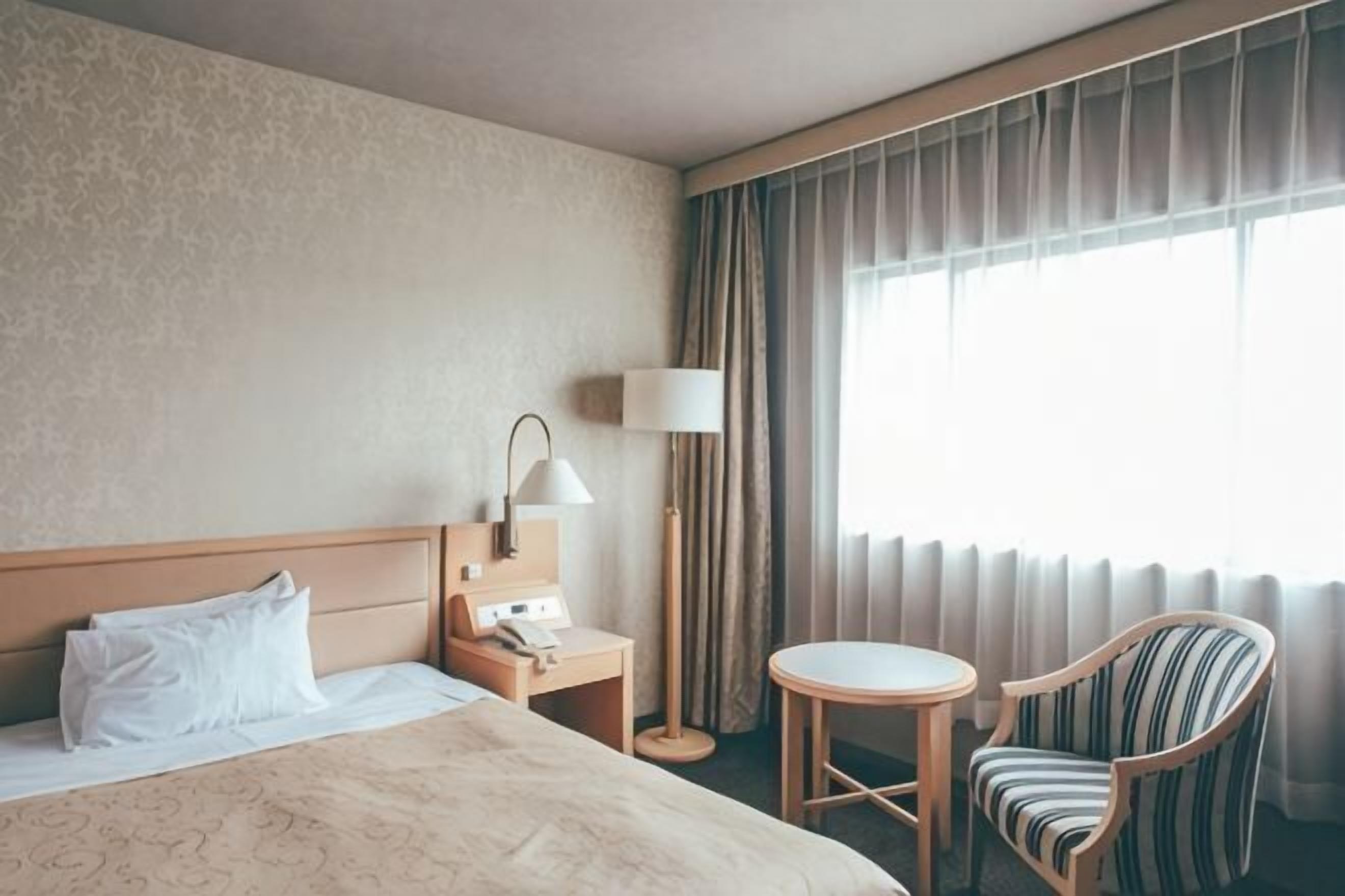Premium bedding, desk, blackout curtains, soundproofing