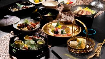 A variety of dishes and bowls on a table, suggesting a meal setting.