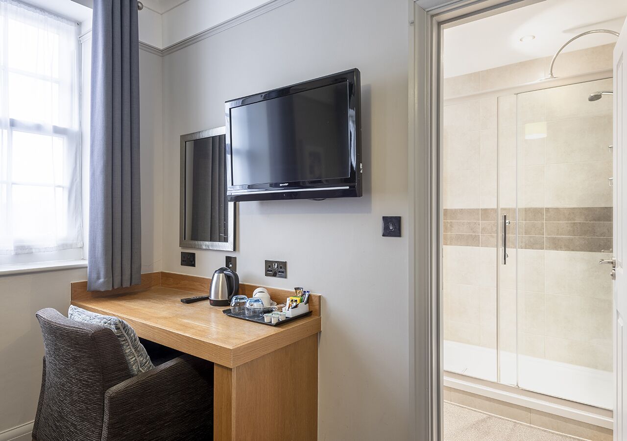 combined shower/bathtub, free toiletries, hair dryer, towels