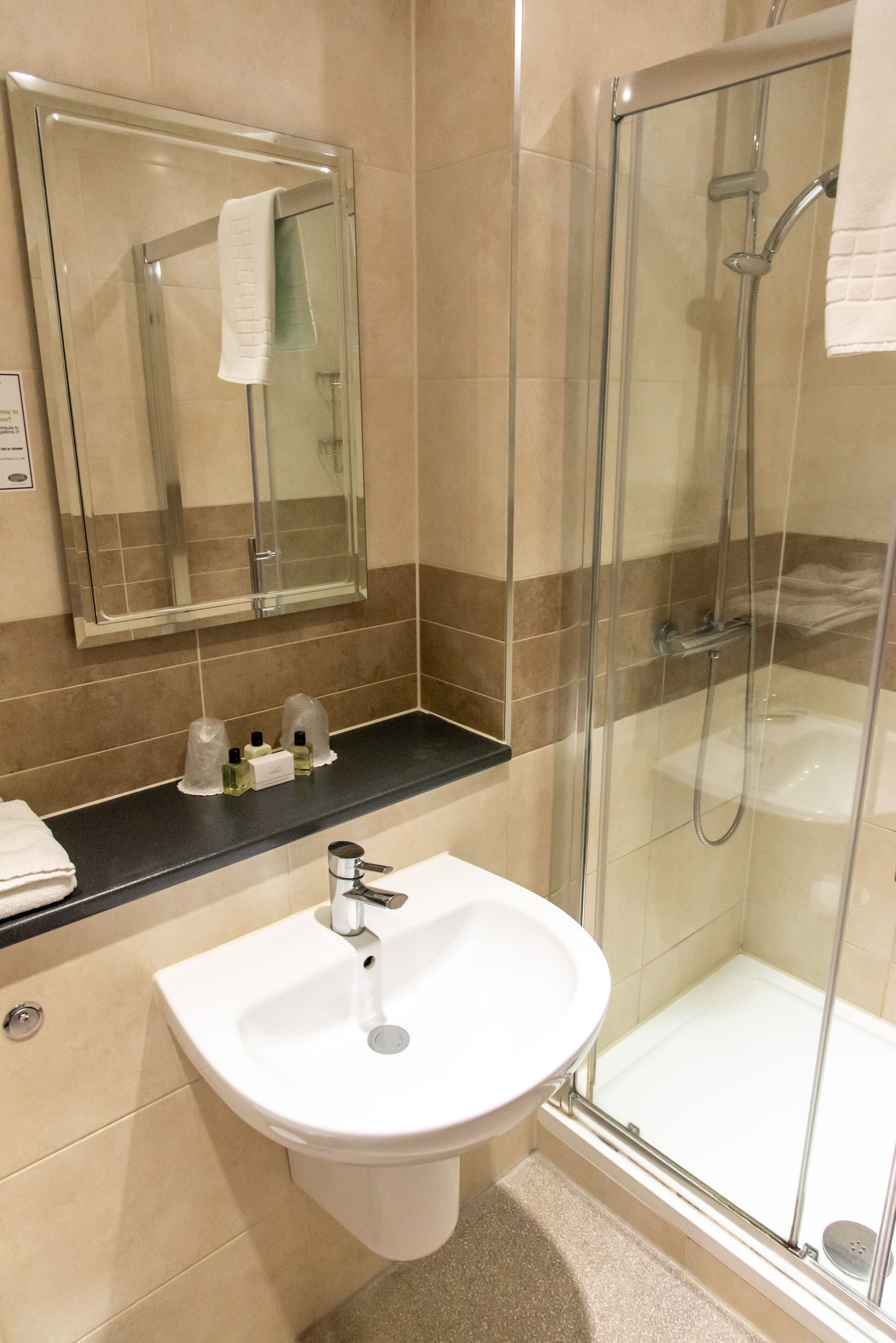 combined shower/bathtub, free toiletries, hair dryer, towels