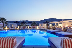 Seasonal outdoor pool, pool umbrellas, pool loungers