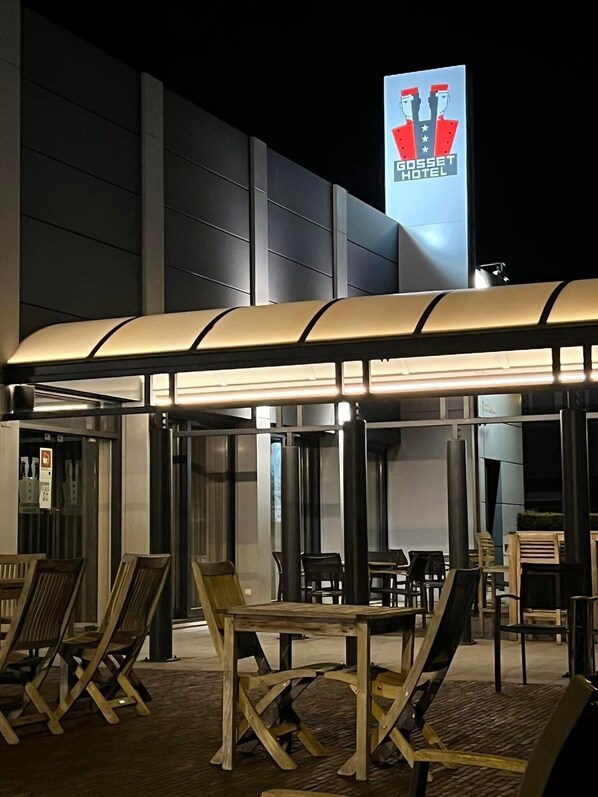 Relax in our covered patio with comfortable seating and tables.