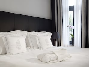 Premium bedding, down duvets, pillow-top beds, minibar