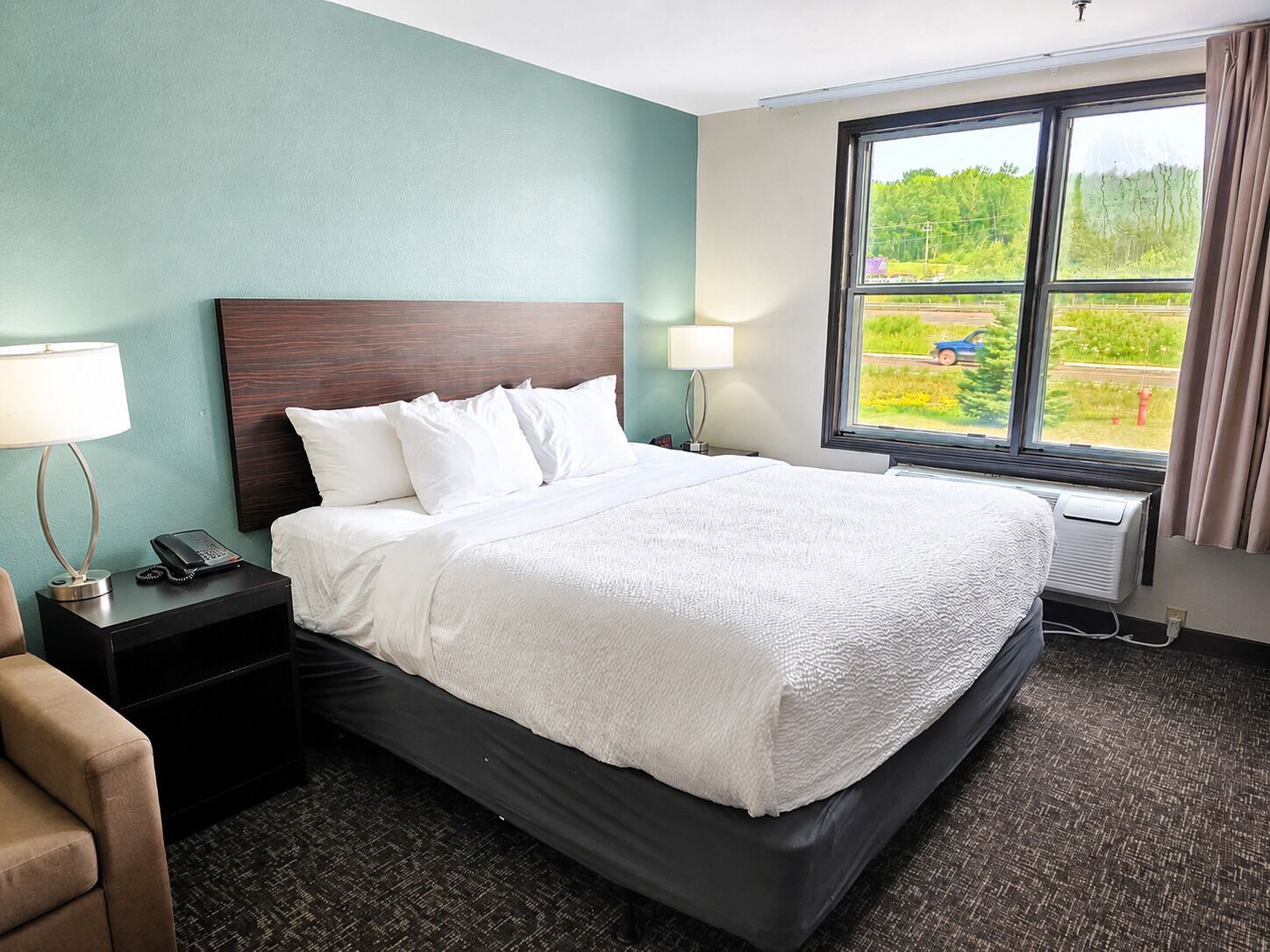 Hypo-allergenic bedding, in-room safe, blackout curtains