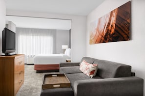 Premium bedding, desk, laptop workspace, blackout curtains