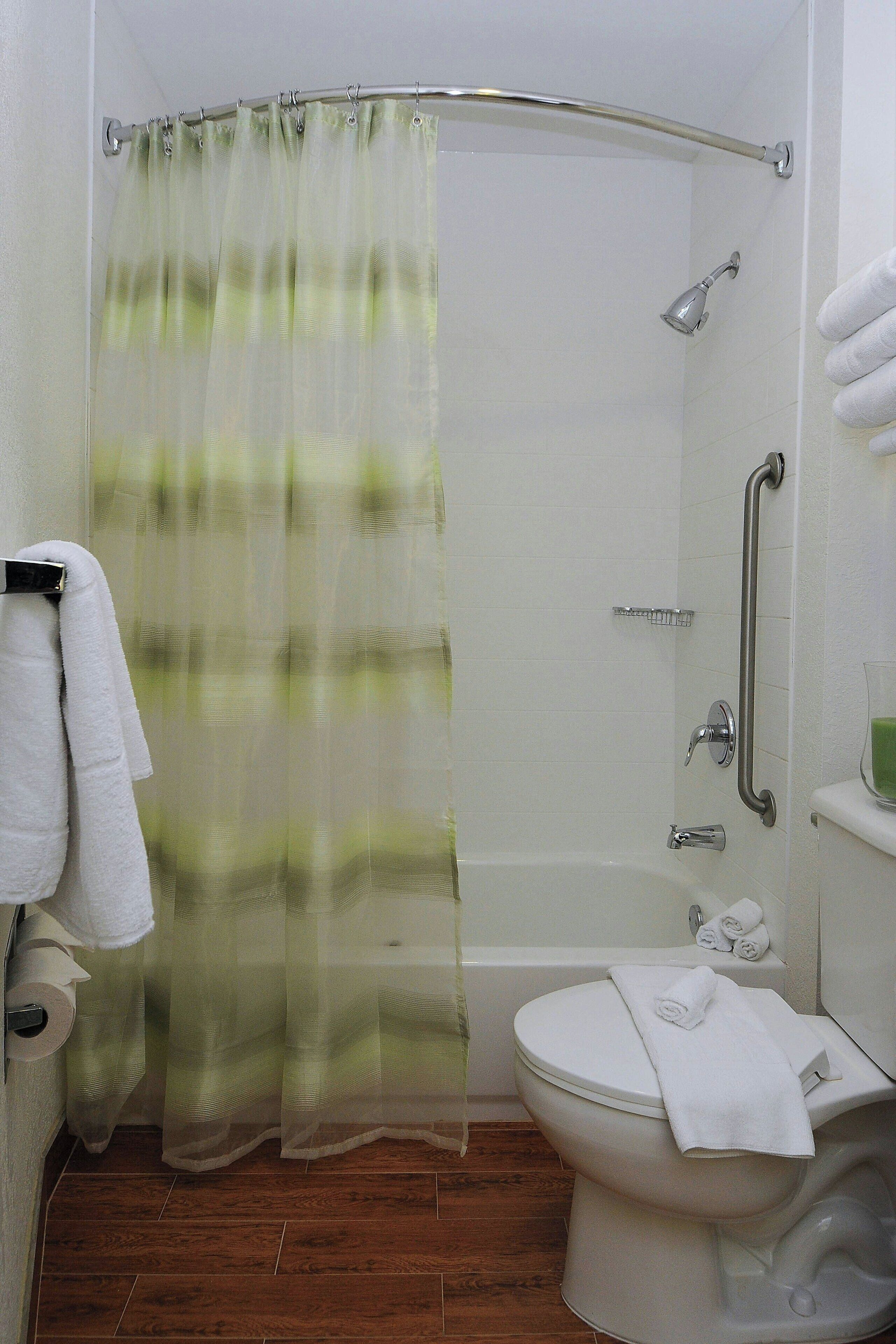 suite, multiple beds, non smoking | bathroom | combined shower/bathtub, free toiletries, hair dryer, towels