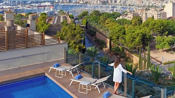 Enjoy breathtaking views of the marina and cityscape from our rooftop pool area.