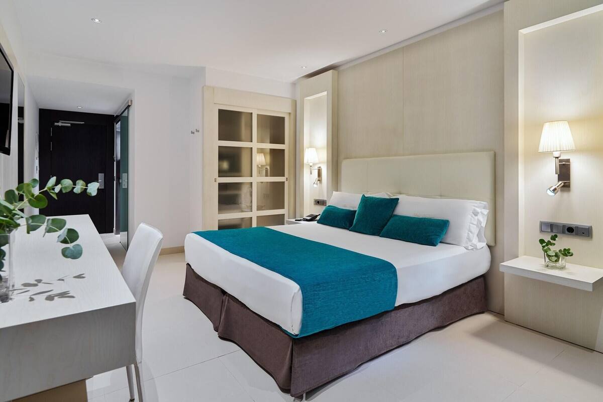 Ropa de cama de alta calidad y minibar