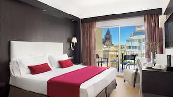 Luxe beddengoed, een minibar, een kluis op de kamer, een bureau