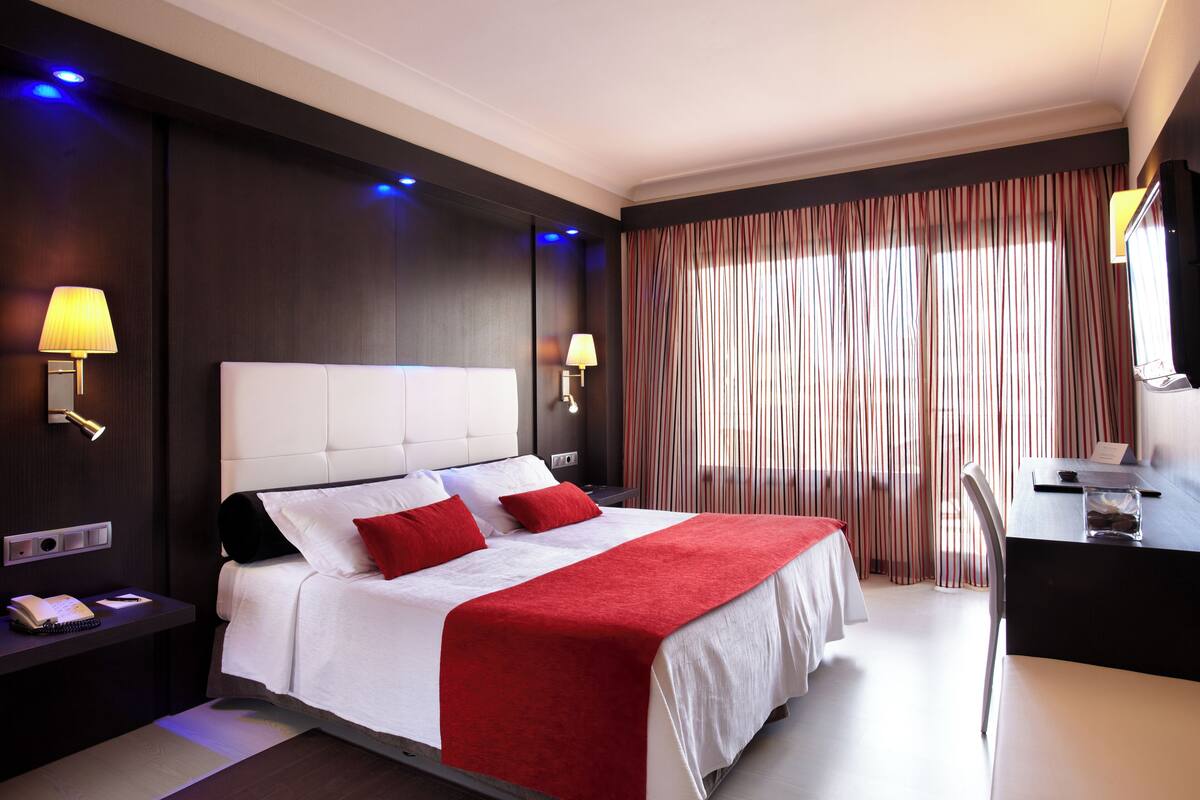 Ropa de cama de alta calidad y minibar