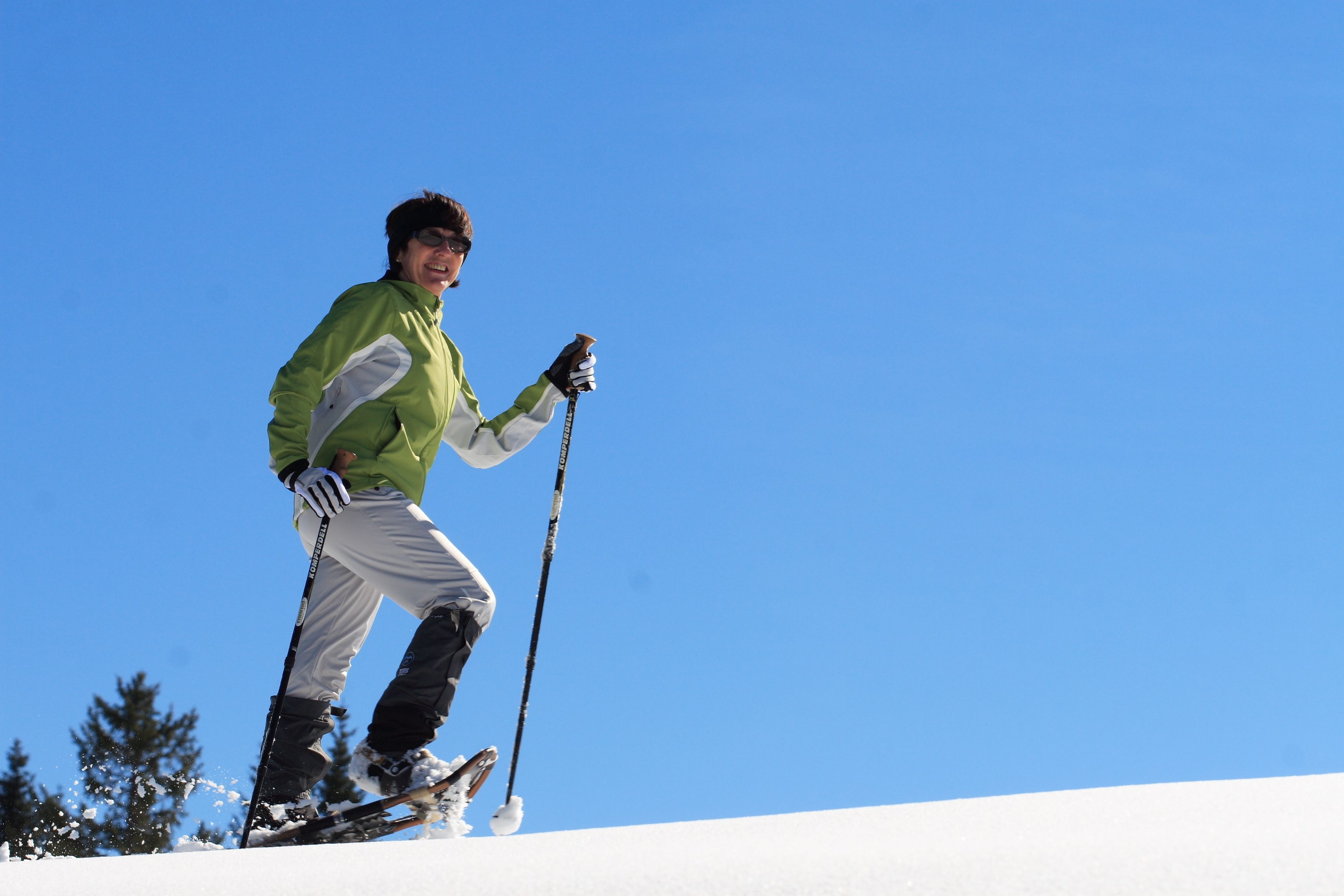 A person skiing on a snowy slope.