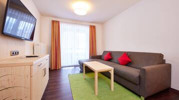 Deluxe Condo | Ruang tamu | TV LCD