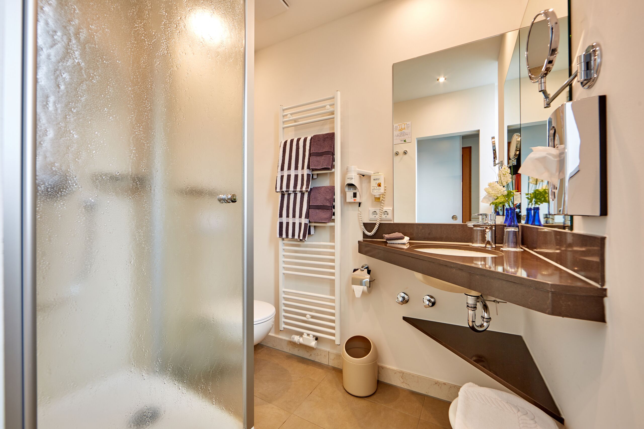 superior double room | bathroom | hair dryer, towels