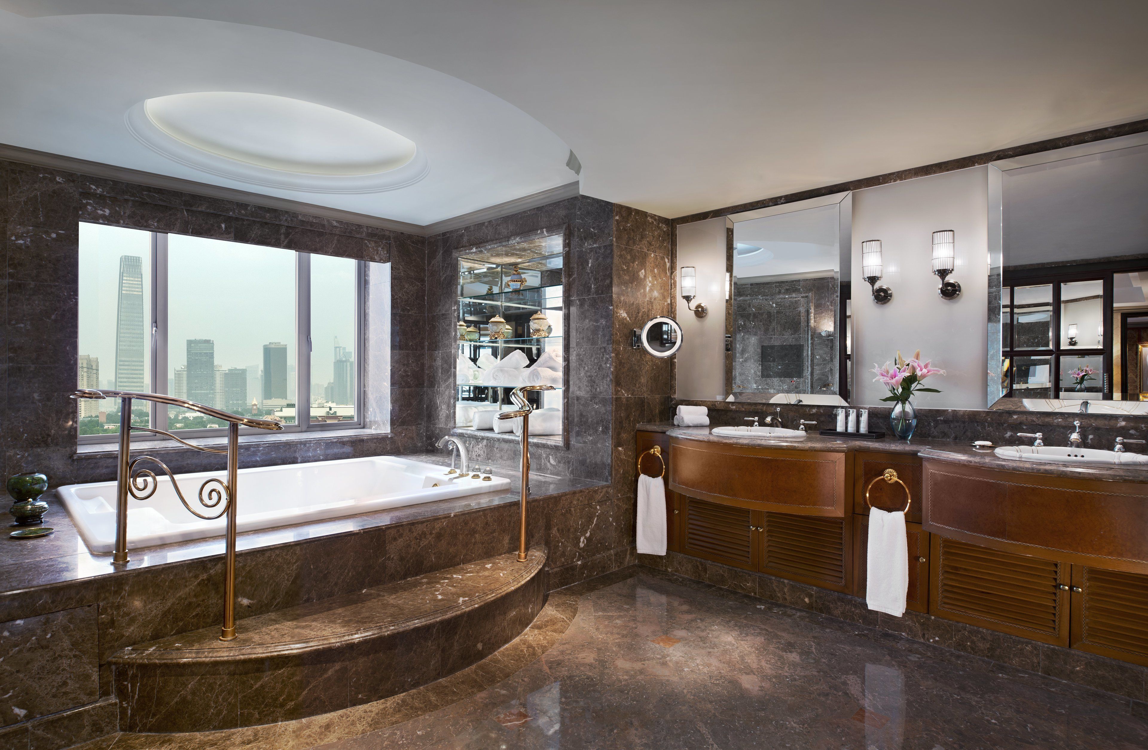 combined shower/bathtub, deep-soaking bathtub, rainfall showerhead