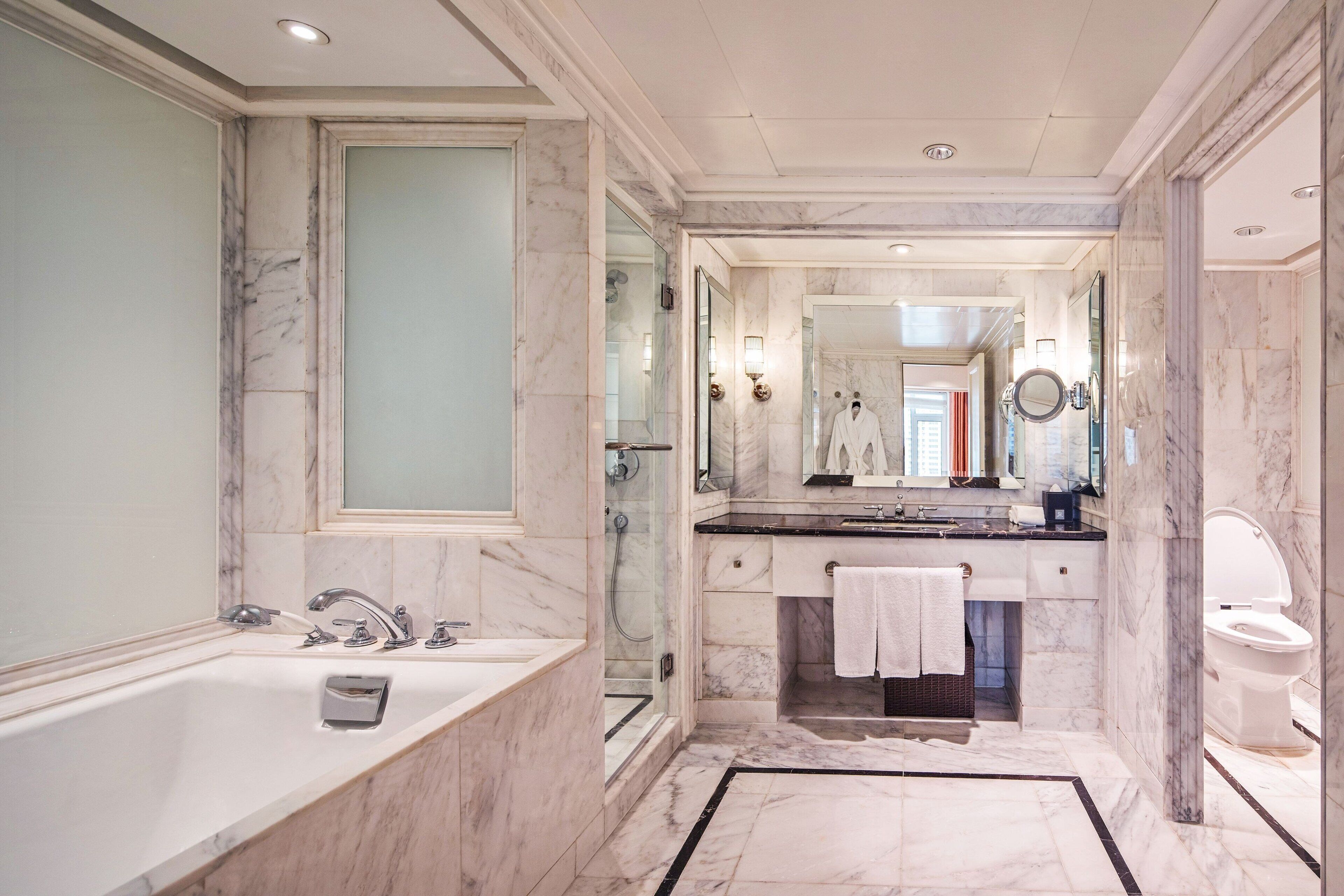 combined shower/bathtub, deep-soaking bathtub, rainfall showerhead