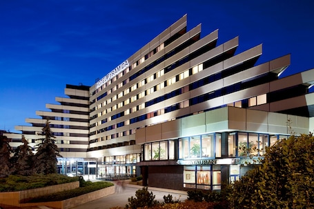 Front of property - evening/night. OREA Hotel Pyramida Praha