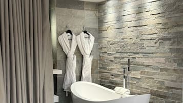 Suite | Bathroom | Hair dryer, towels