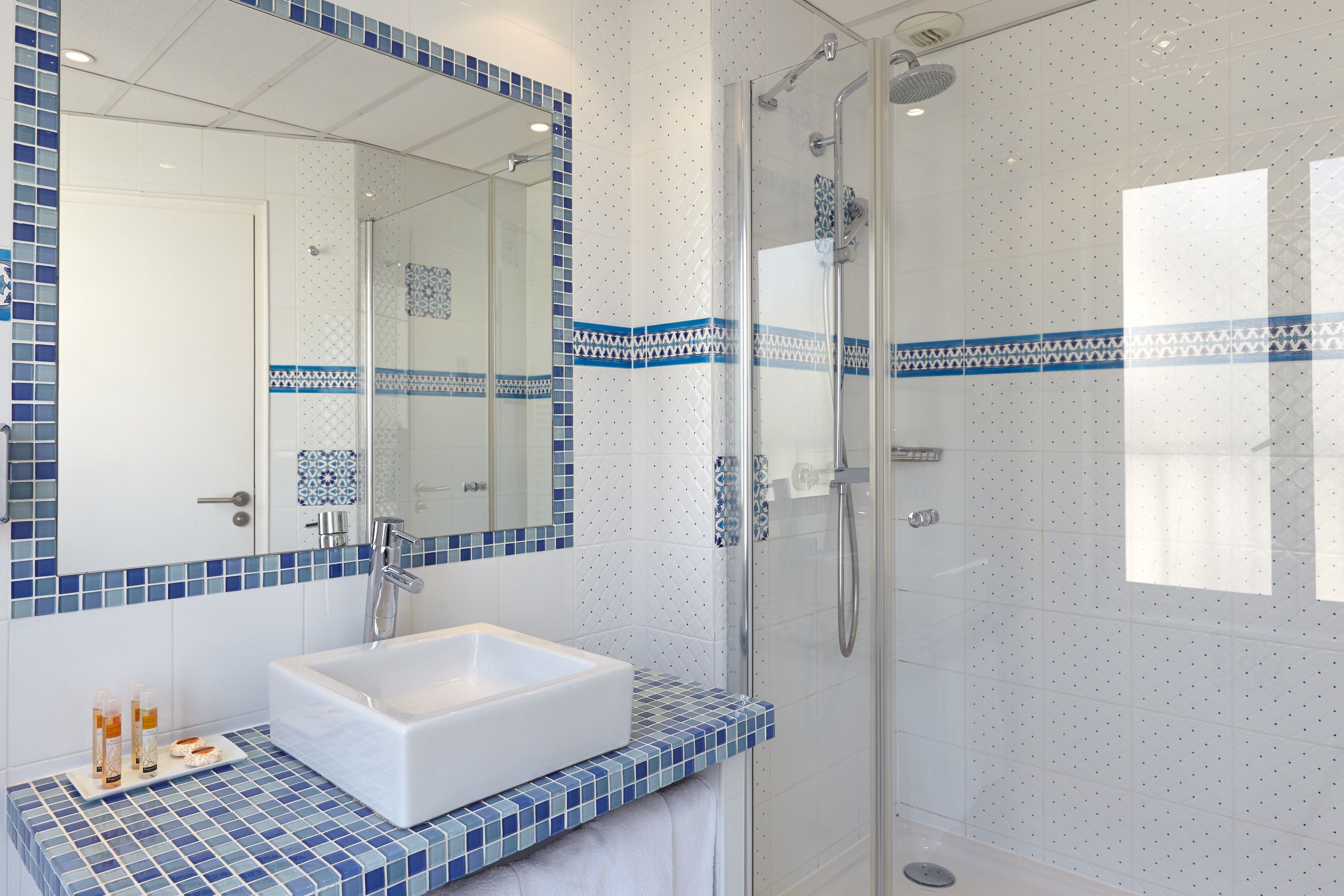 free toiletries, hair dryer, slippers, towels