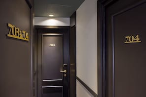 Communicating Room | Premium bedding, memory foam beds, in-room safe, desk