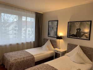 Triple Room, City View | Hypo-allergenic bedding, down duvets, Select Comfort beds