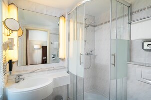 Hair dryer, towels, soap, shampoo