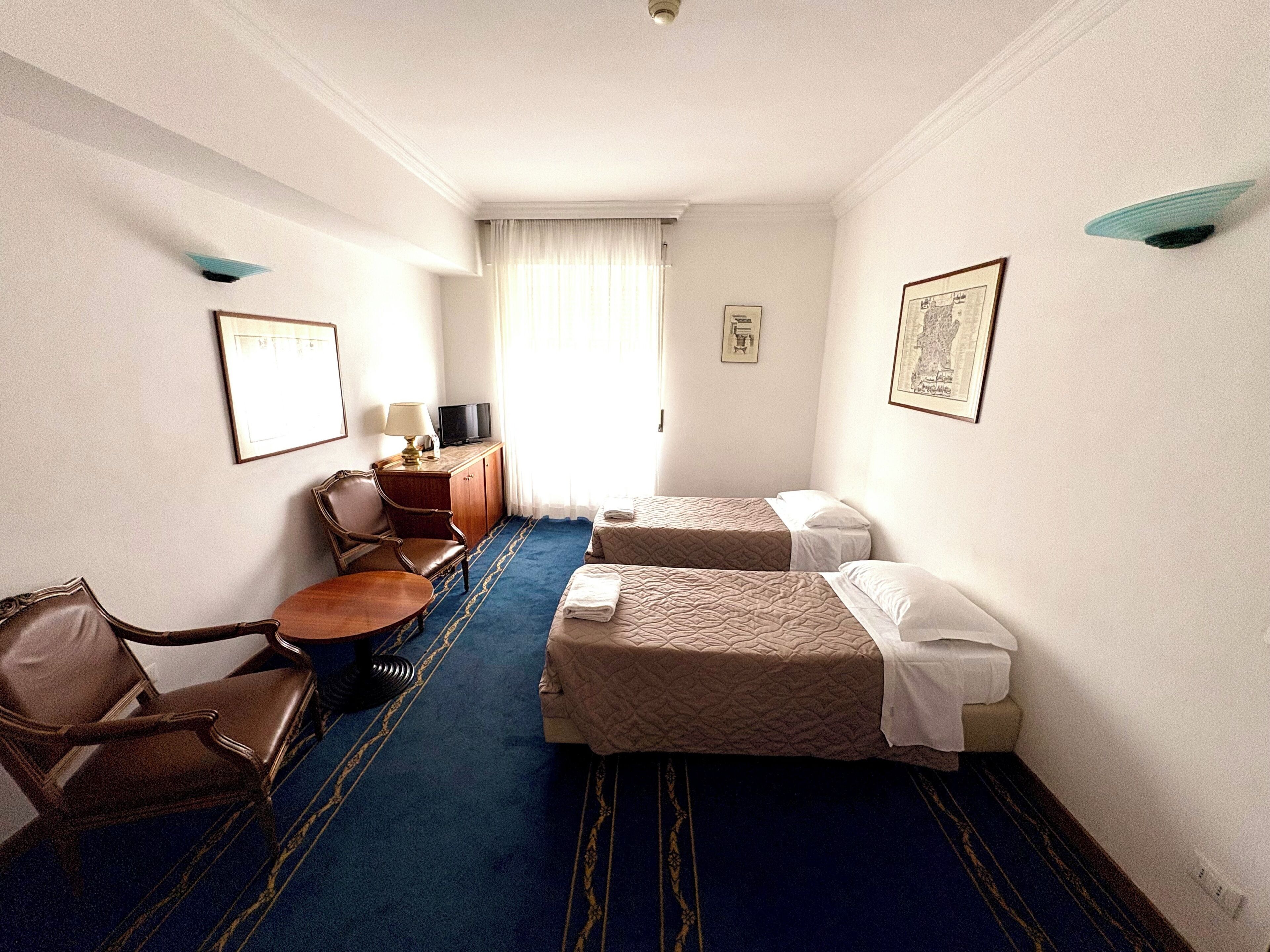 Suite, Multiple Beds, Non Smoking | In-room safe, desk, iron/ironing board, free cribs/infant beds