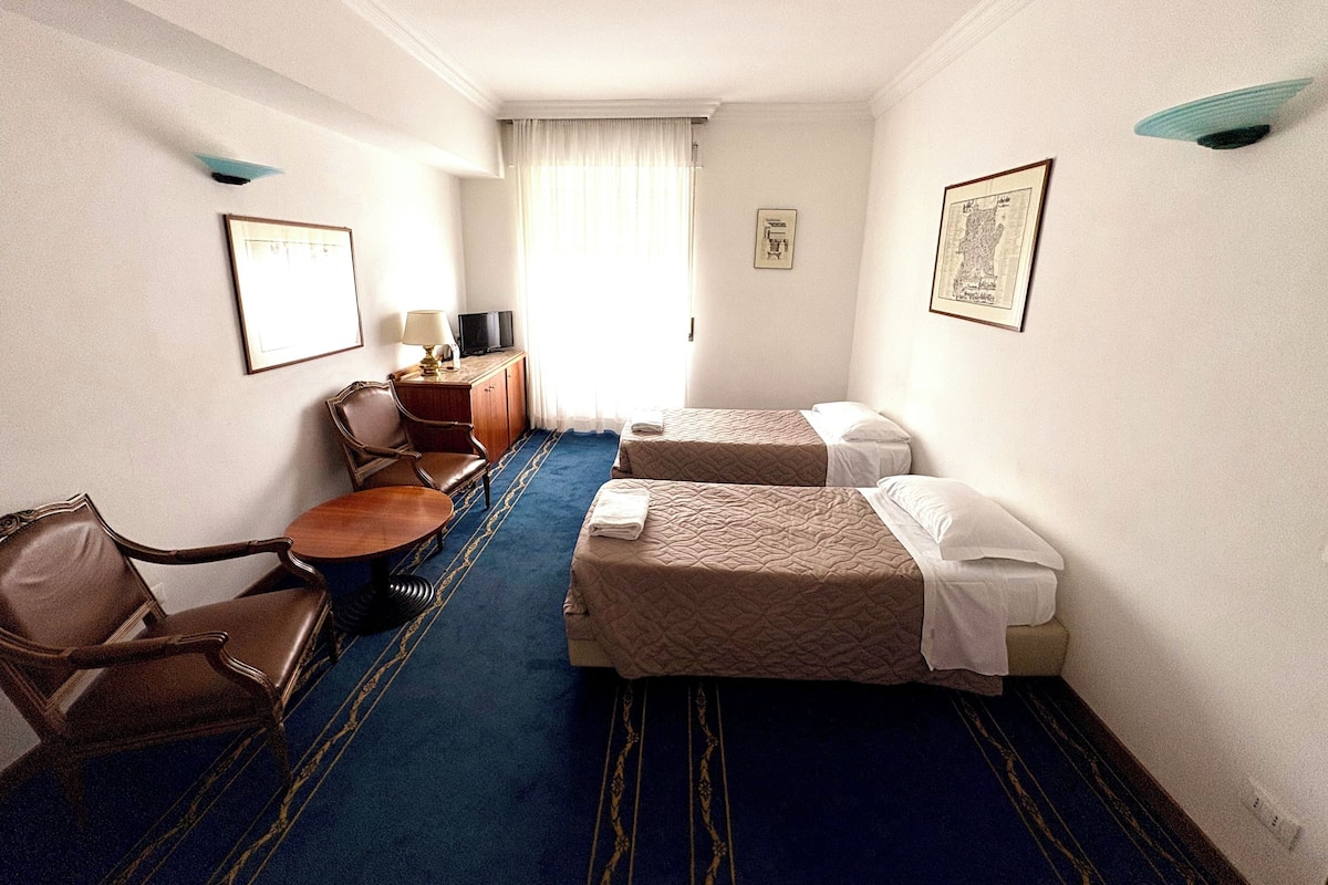 Suite, Multiple Beds, Non Smoking | In-room safe, desk, iron/ironing board, free cribs/infant beds