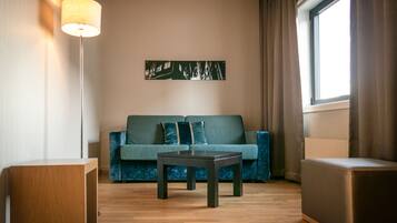 Quarto família, para não fumantes | Área de estar | TV 42 polegadas com canais a cabo