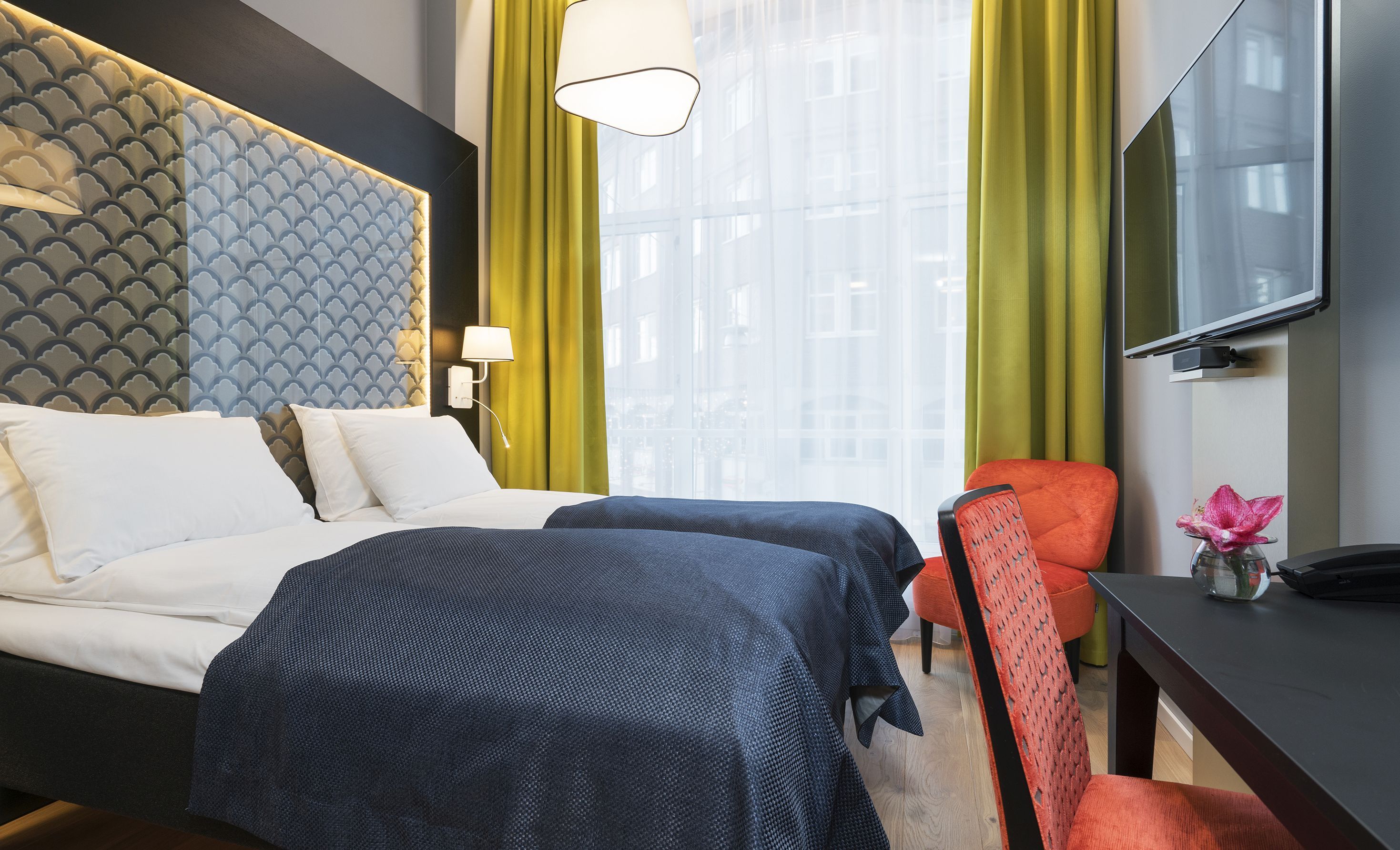 Luxe beddengoed, pillowtop-bedden, een kluis op de kamer, een bureau