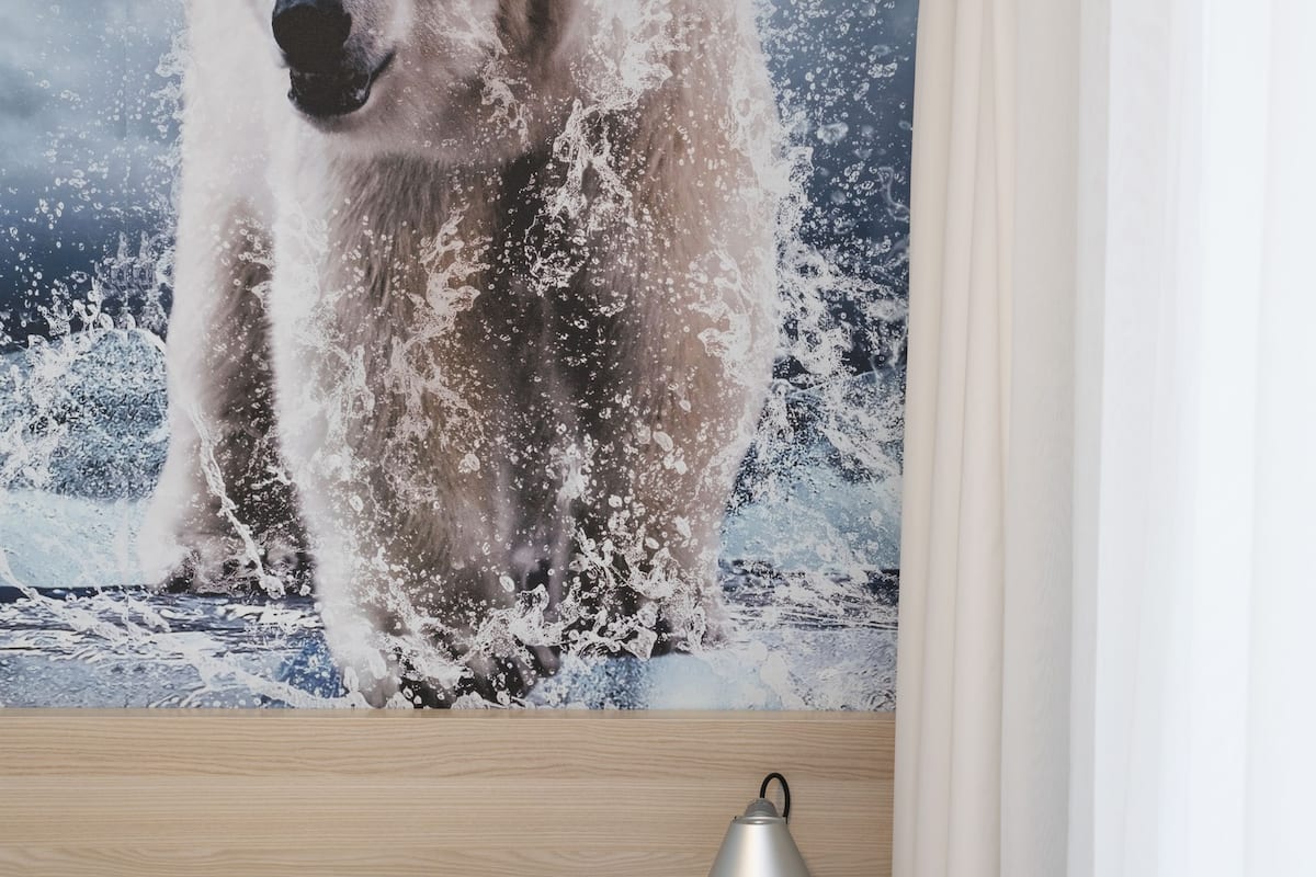 Luxe beddengoed, pillowtop-bedden, een minibar, een bureau