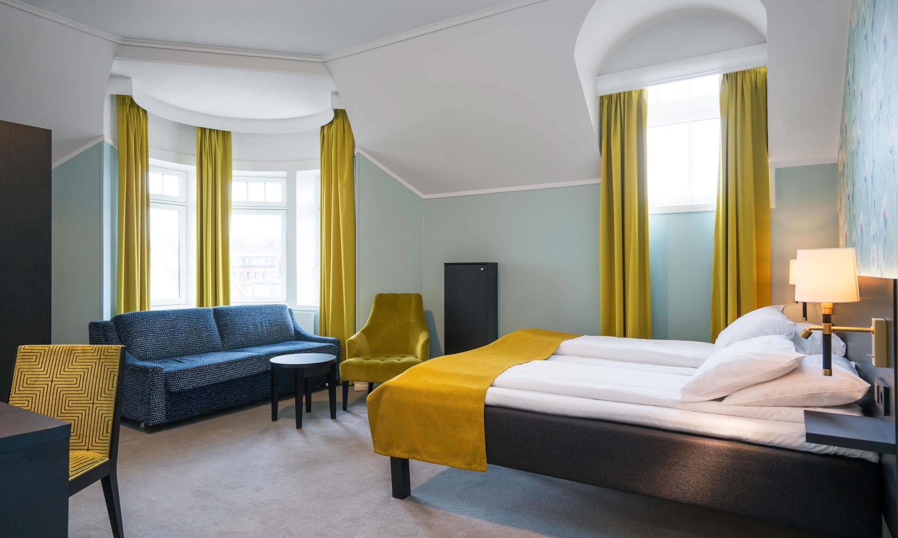 family room, 2 single beds, non smoking (standard) | 1 bedroom, desk, laptop workspace, iron/ironing board