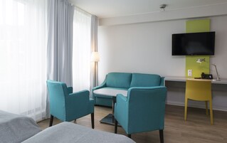 Desk, laptop workspace, free WiFi, bed sheets