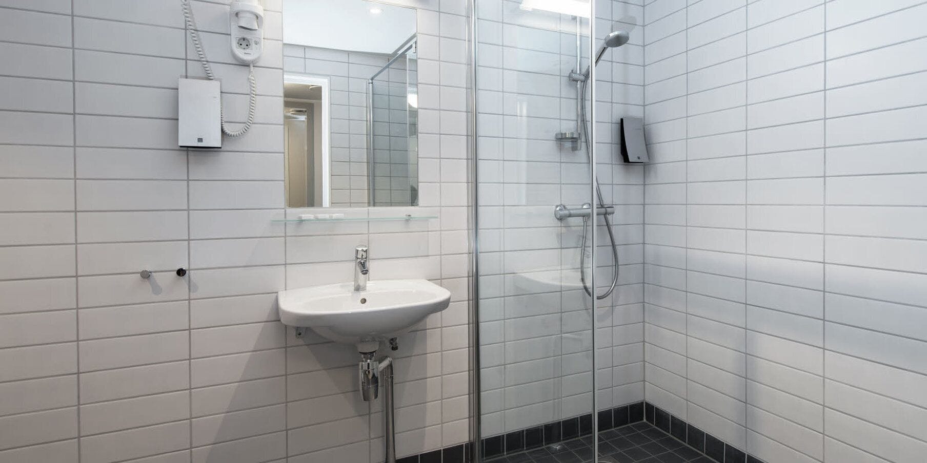 shower, hair dryer, heated floors, towels