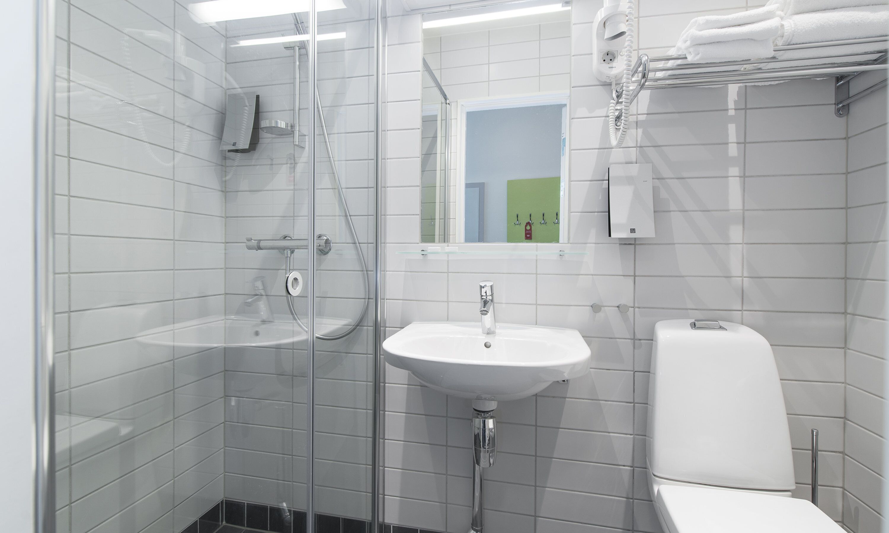 shower, hair dryer, heated floors, towels