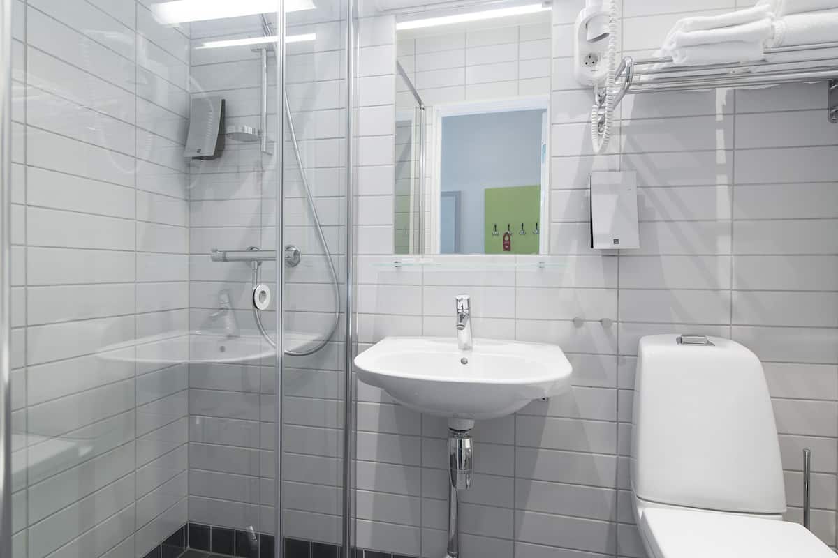 shower, hair dryer, heated floors, towels