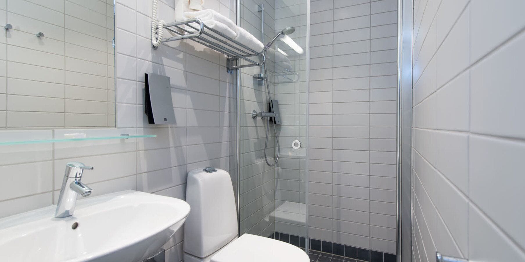 shower, hair dryer, heated floors, towels
