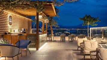 Breakfast, lunch, dinner served; local cuisine, pool views