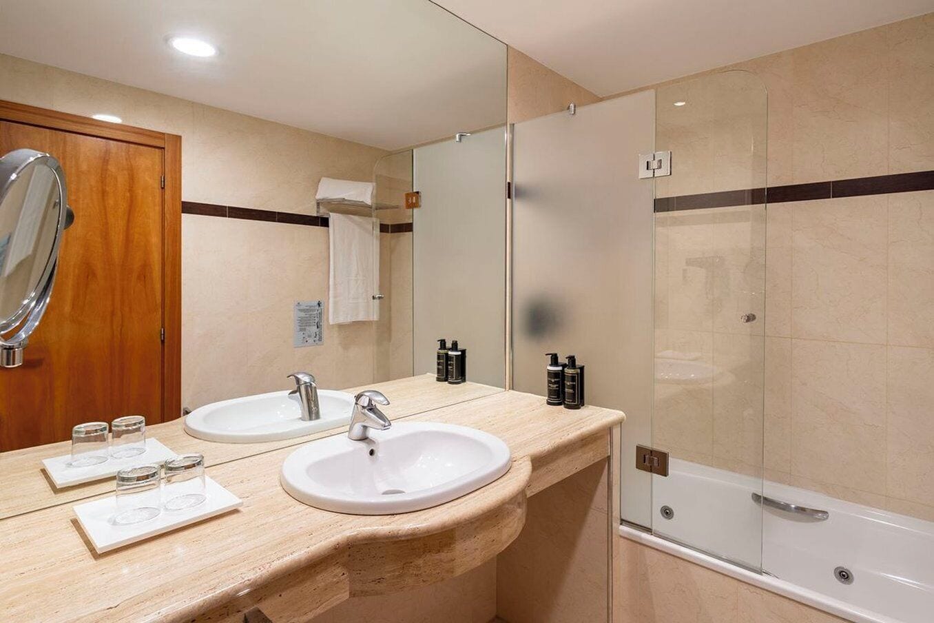 eco-friendly toiletries, hair dryer, towels, soap