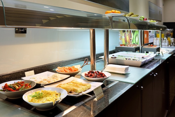 Daily buffet breakfast (EUR 13 per person)