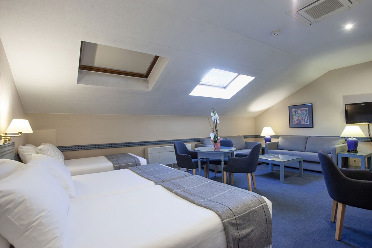 Pillow-top beds, minibar, in-room safe, desk