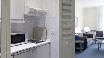 Suíte (2 adults + 2 children) | 1 quarto, camas com colchões pillow-top, frigobar, cofres nos quartos