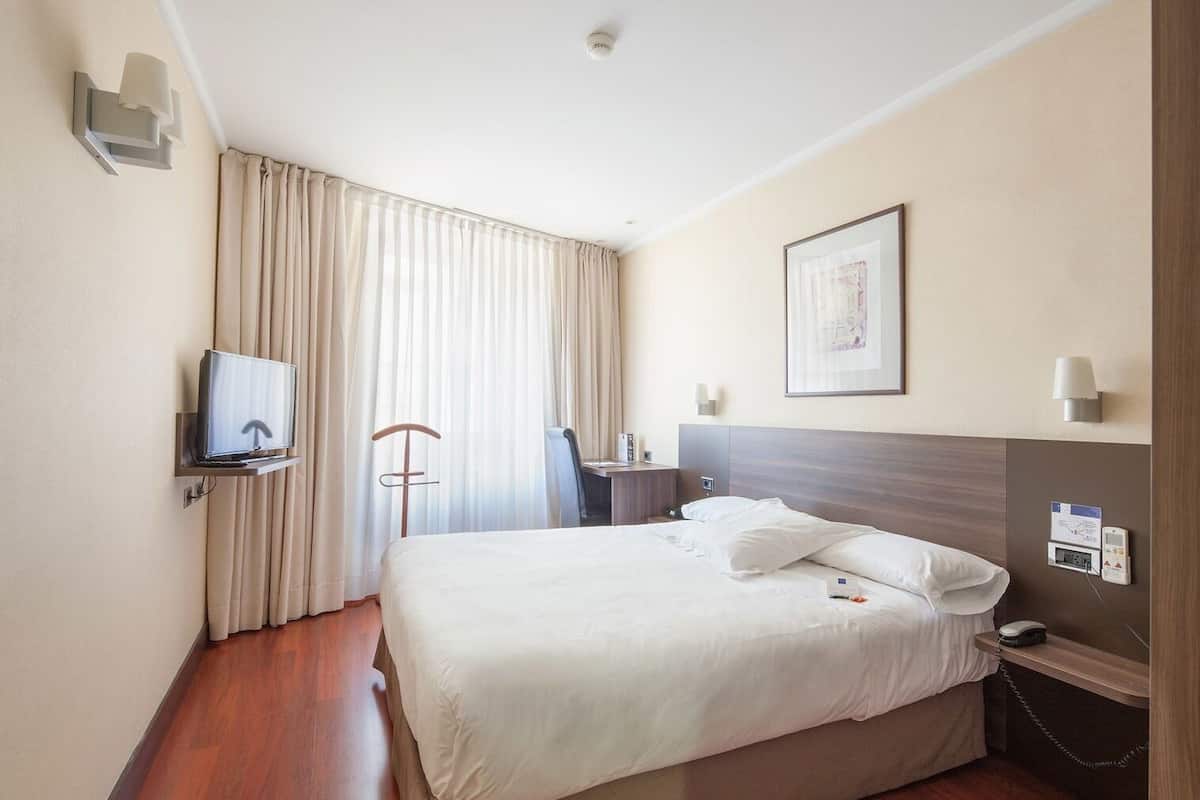 Ropa de cama de alta calidad y minibar