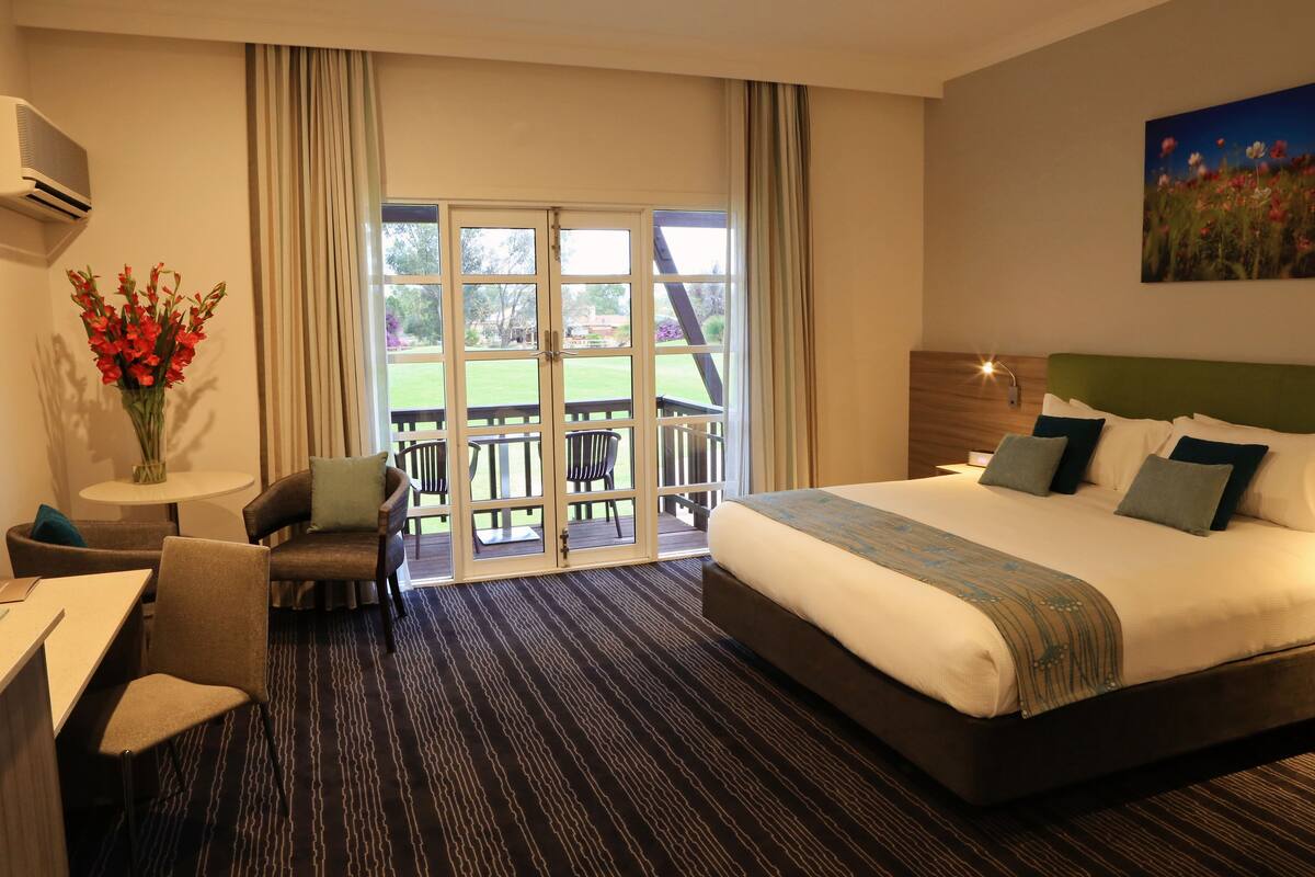 room, 1 king bed (resort) | in-room safe, desk, blackout curtains, iron/ironing board