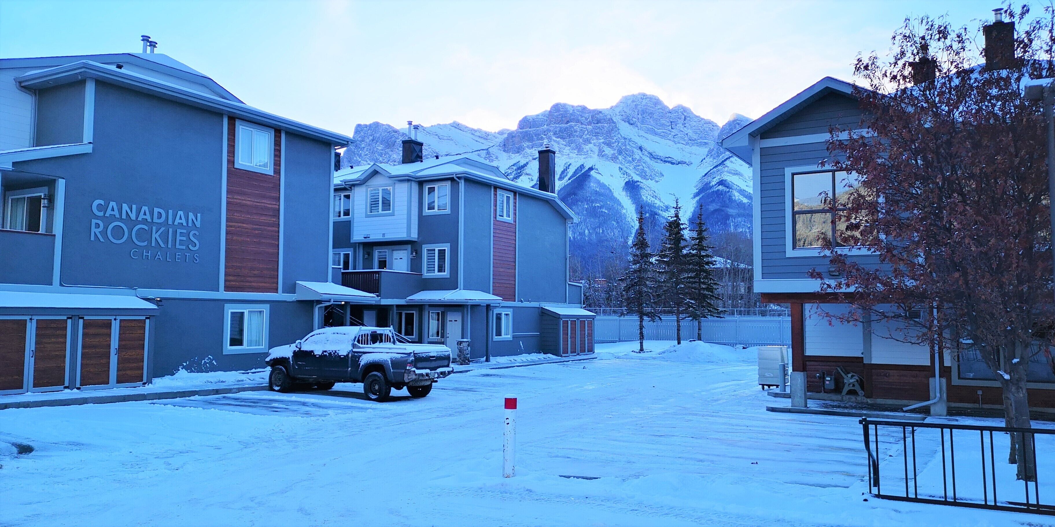 A residential area with houses labeled "Canadian Rockies Chalets."